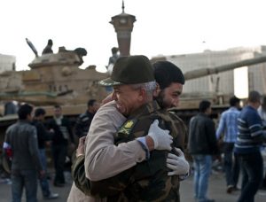 An-Egyptian-man-hugs-an-officer