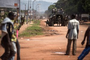 Troops from the multinational African force FOMAC take control of a street